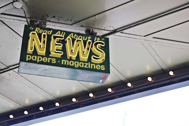 newspaper sig hanging from ceiling